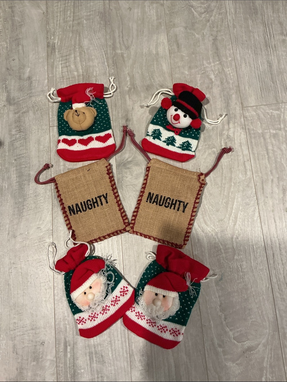 Festive  4 Knit Holiday Gift Bags and 2 gift sack.